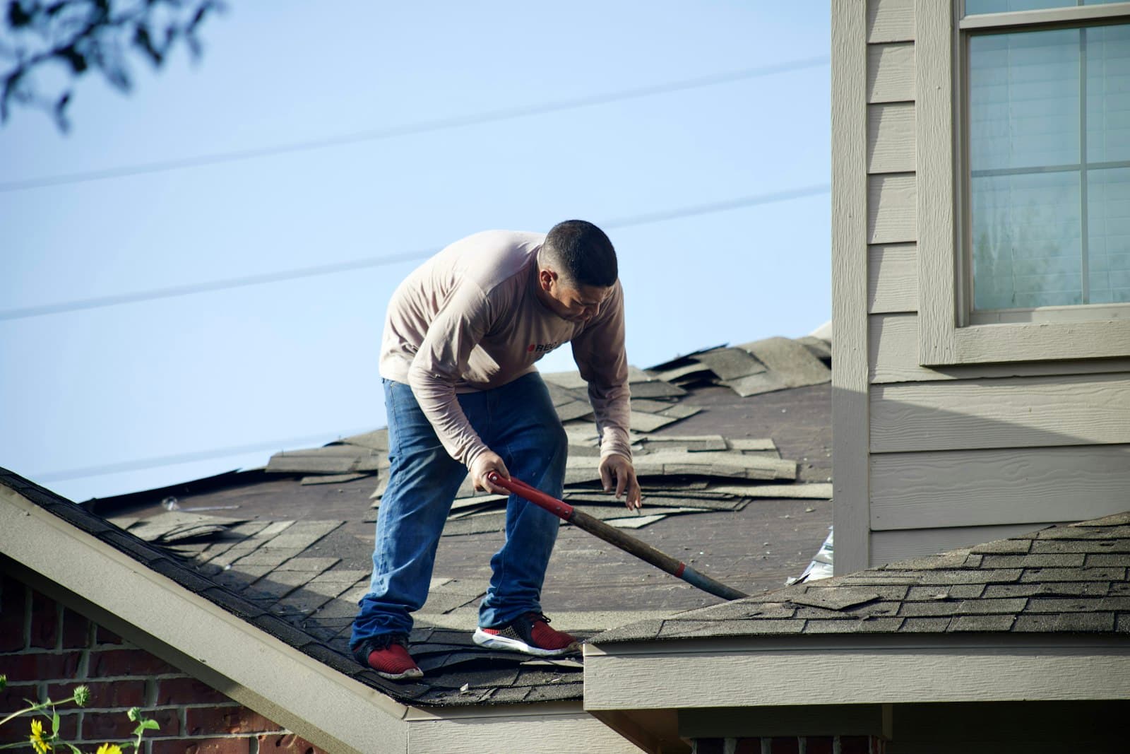 Roofer working on a rooftop